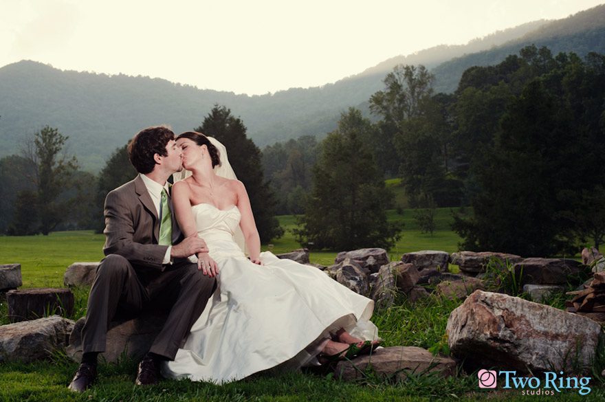 Photo of bride and groom kissing