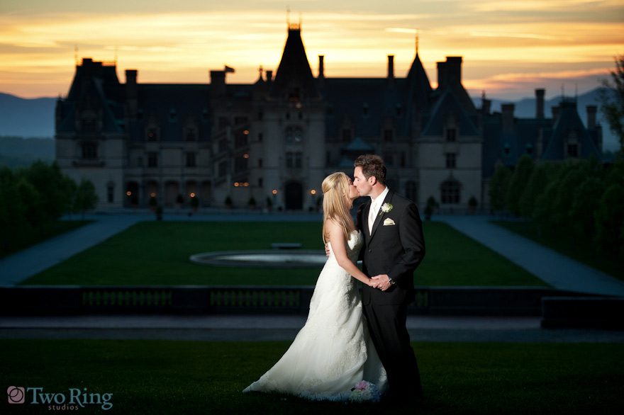 Portrait of bride and groom in front of Biltmore House