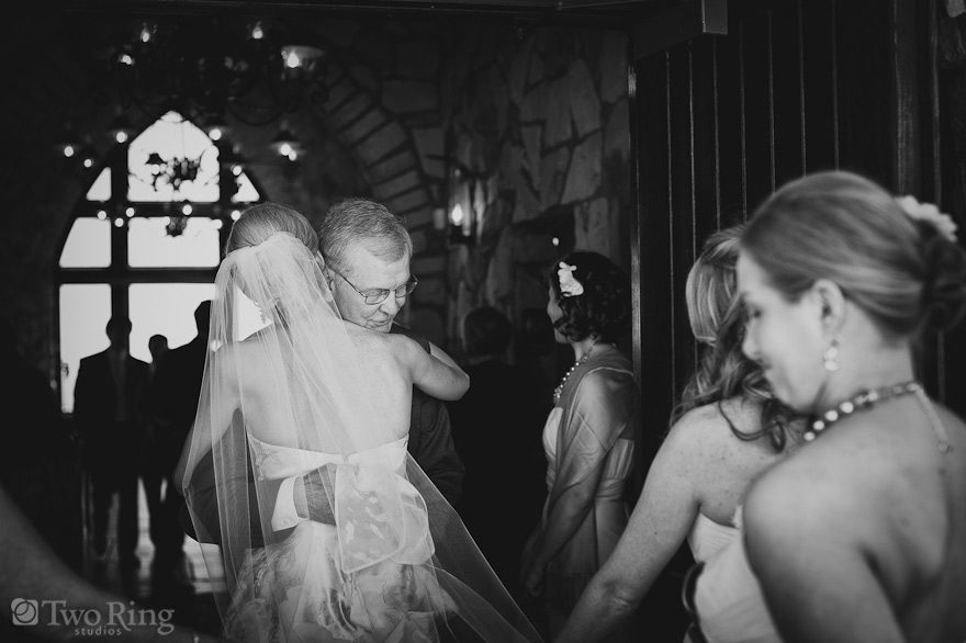 Bride hugs her father